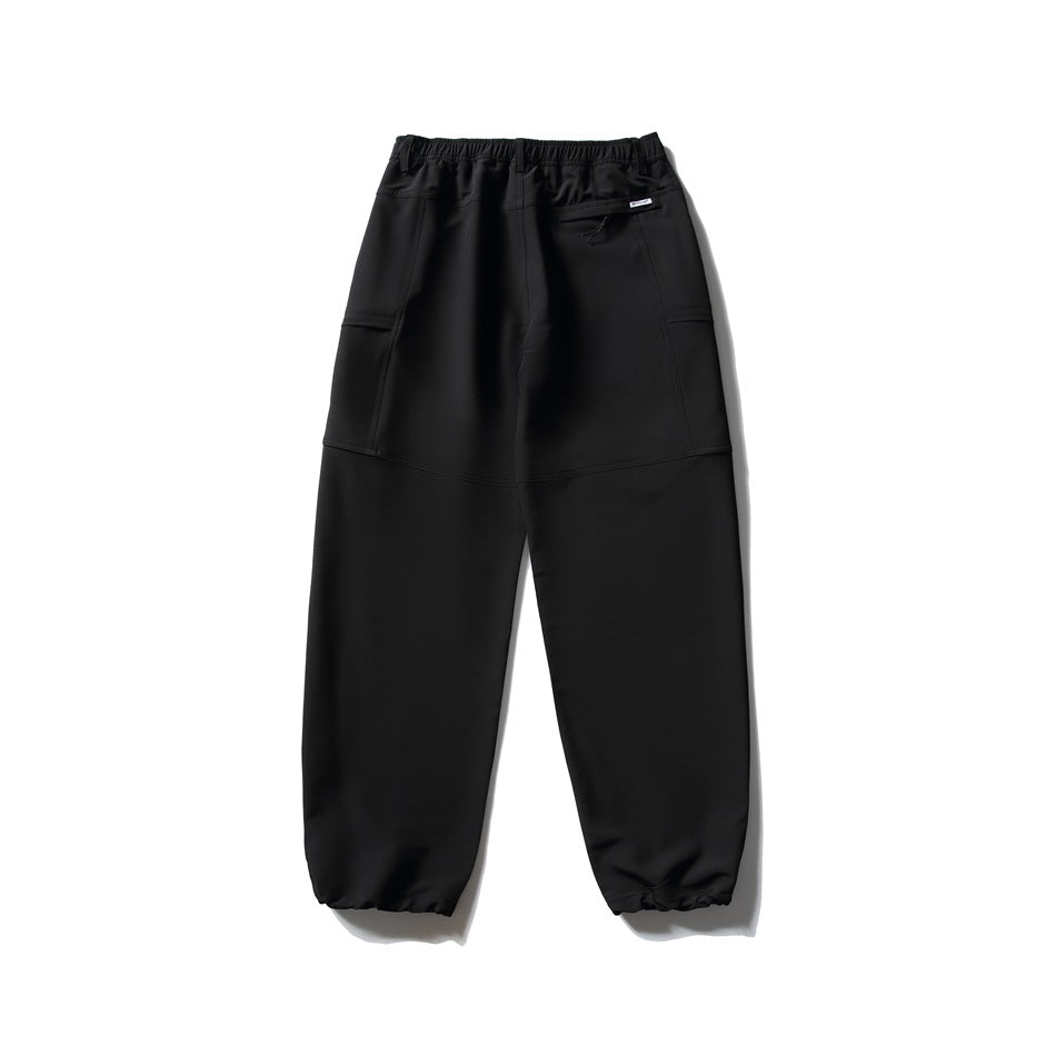 Black relaxed pants, flat back view, with elastic waistband, back pocket with small tag and gathered ankle hems