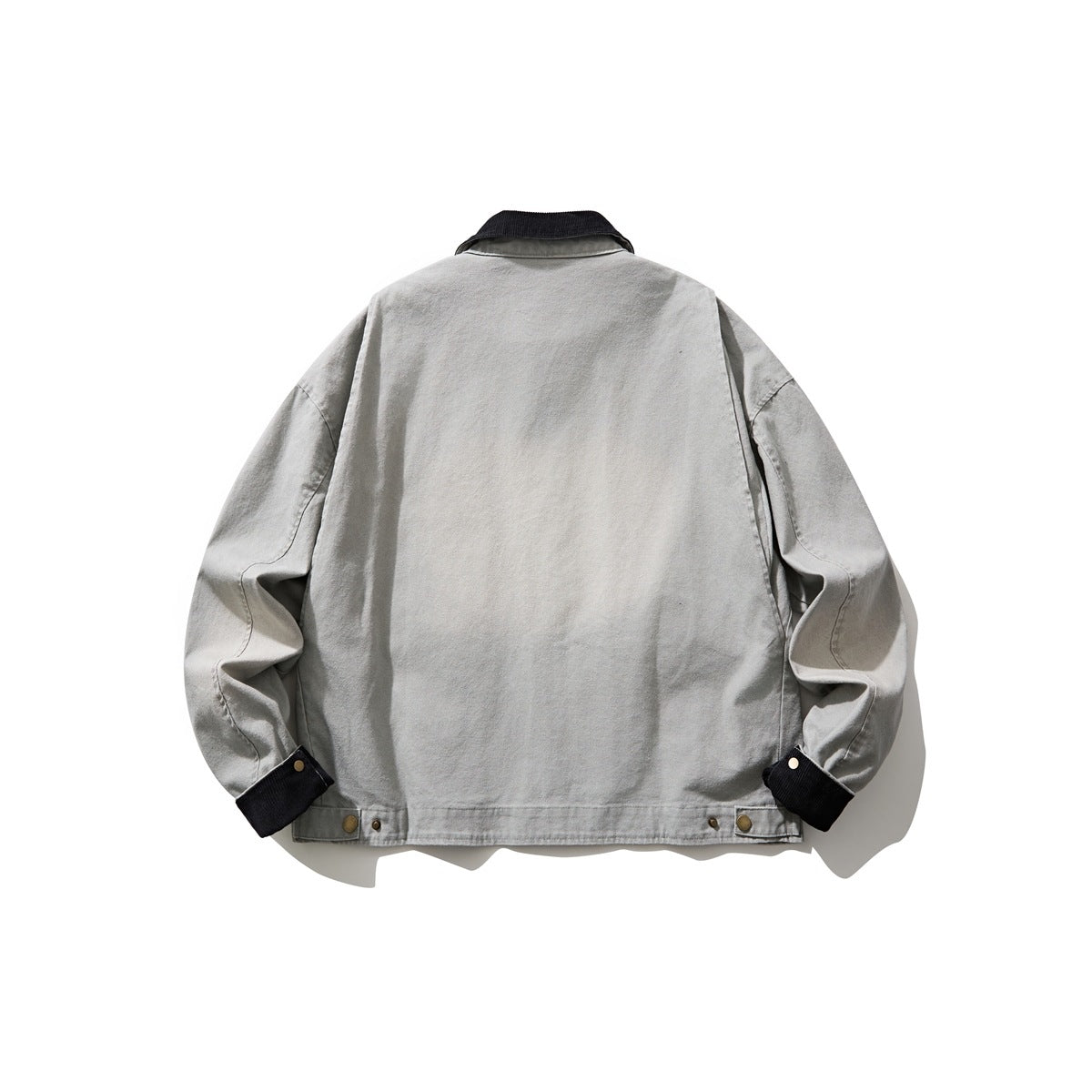 Back view of a light gray jacket with a black collar and cuffs, snap-adjustable hem, and long sleeves.