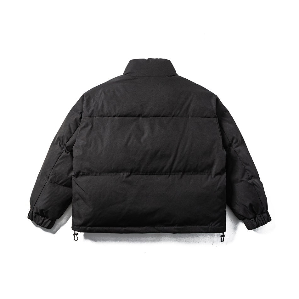 Back view of a black padded jacket with horizontal quilted panels, elastic cuffs and adjustable hem toggles.