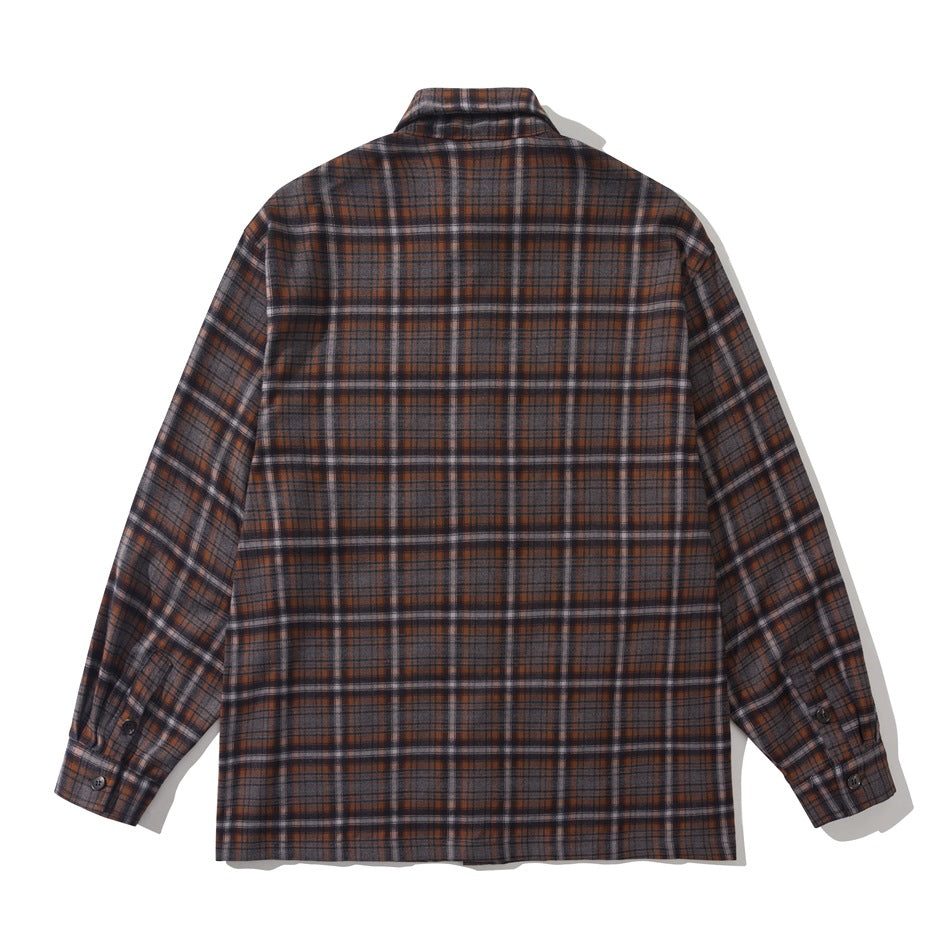 Back view of brown, gray and navy plaid long-sleeve shirt with buttoned cuffs on a plain background