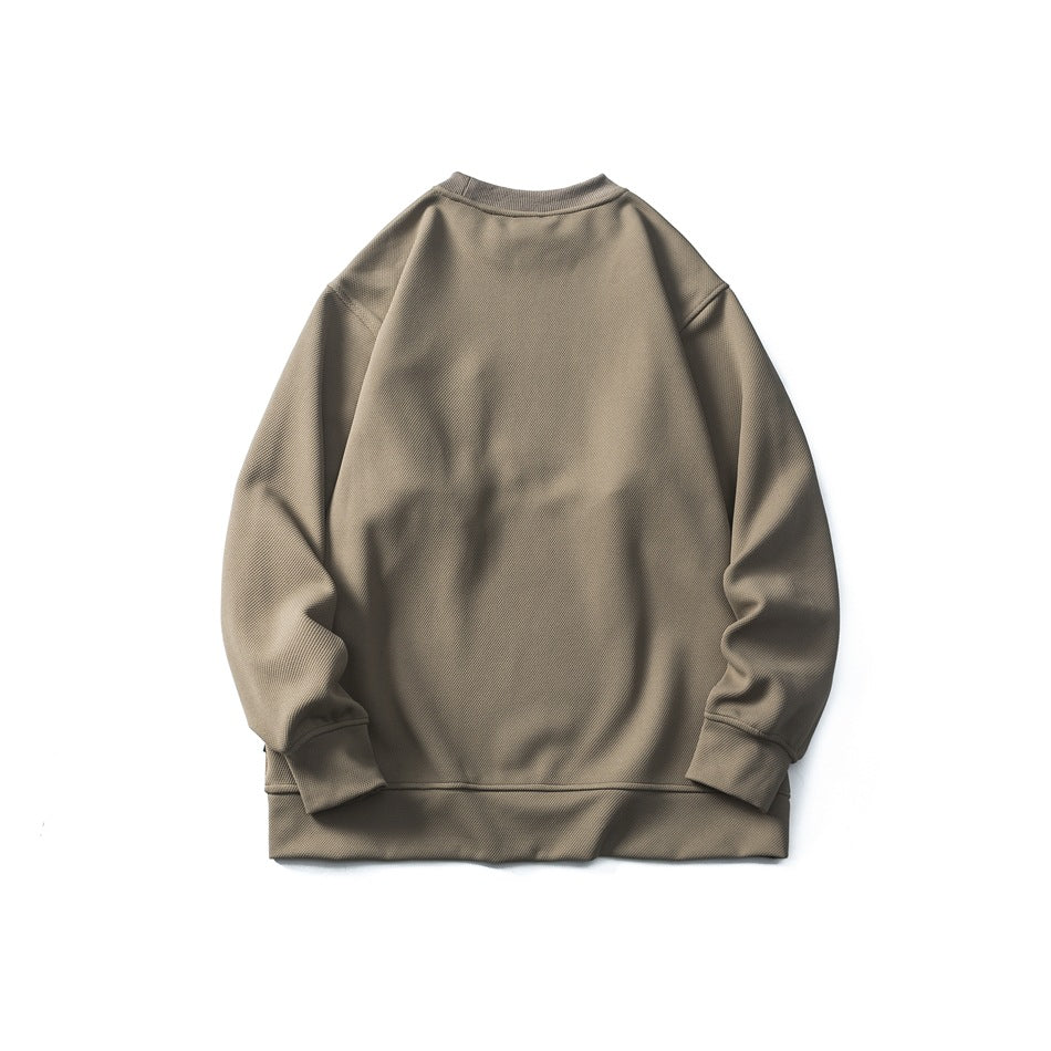 Back view of a taupe crewneck sweatshirt laid flat, showing its plain back, long sleeves, and ribbed cuffs and hem.