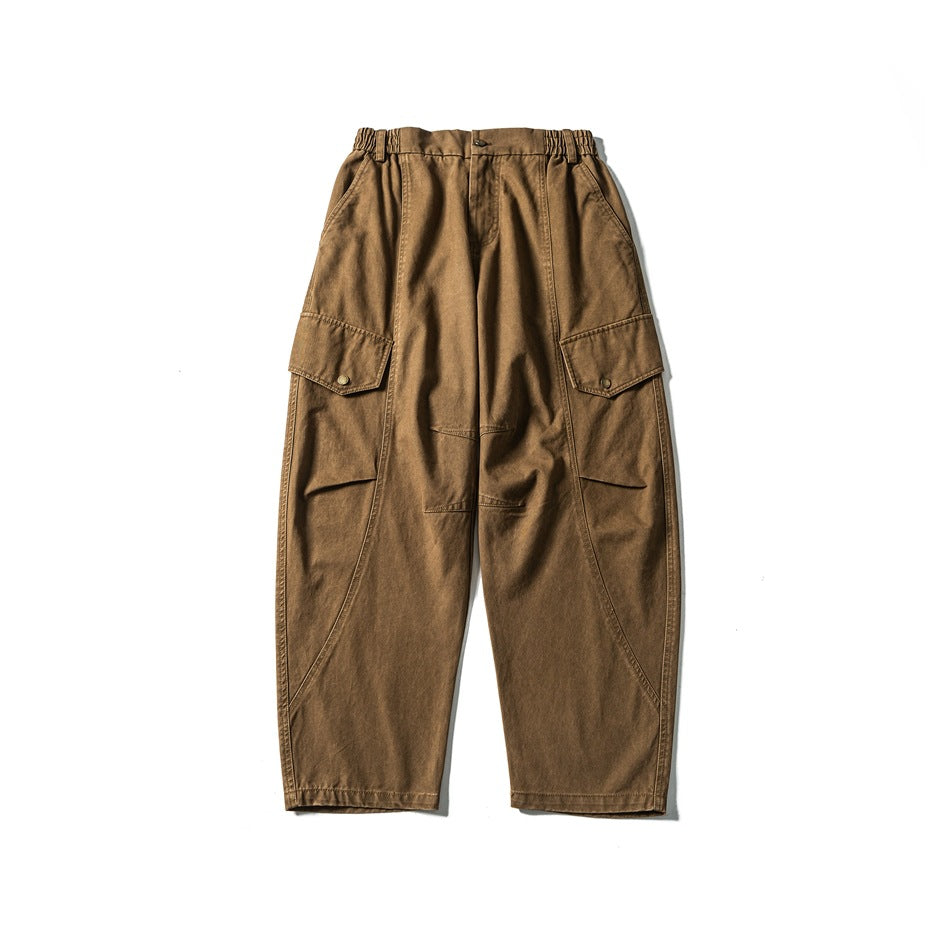 Washed brown wide-leg cargo pants flat lay, front view, elastic waist, button fly and snap flap pockets