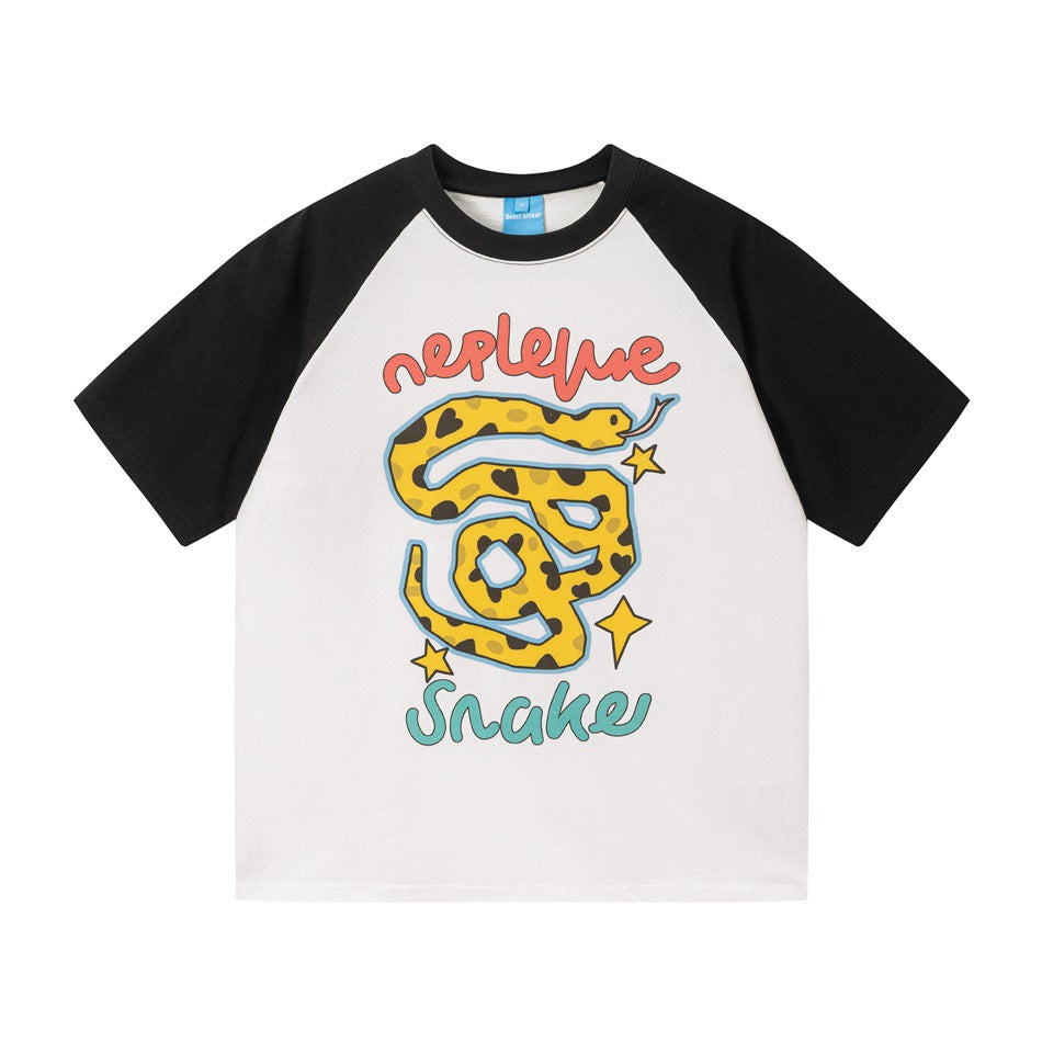 White raglan T-shirt with black sleeves and collar, front cartoon yellow spotted snake print with Snake lettering