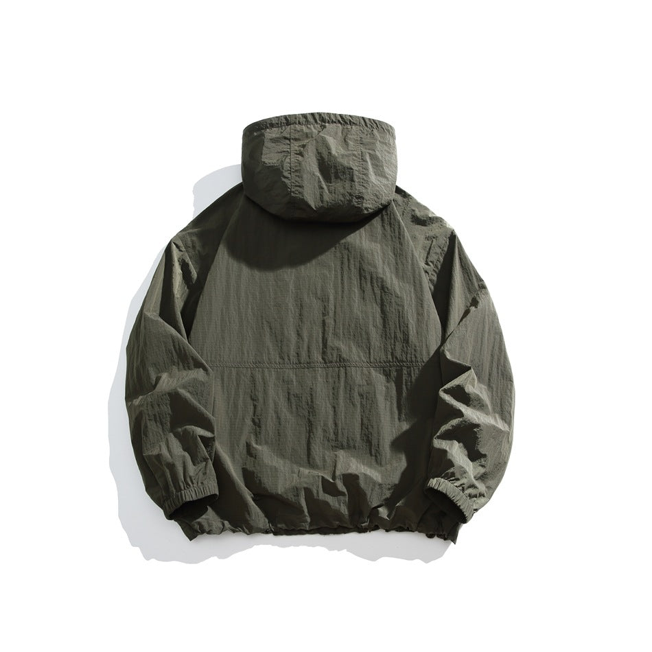 Back view of a dark olive hooded jacket with long sleeves, elastic cuffs, and a gathered hem, laid flat on white.