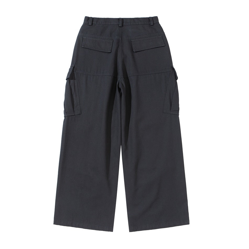 Back view of dark charcoal wide-leg cargo pants with belt loops, two rear flap pockets and side cargo pockets.