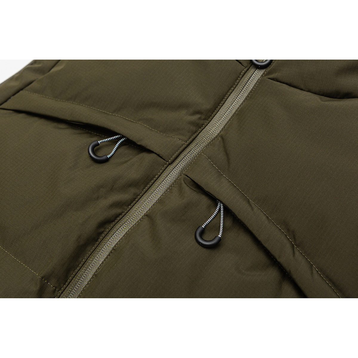 Close-up of an olive vest front with a zipper, stitched panels and corded pulls on its pockets.