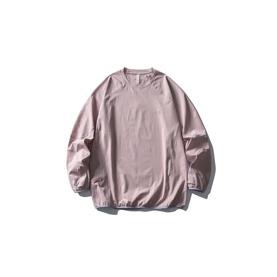 Dusty pink long-sleeve crew-neck top flat lay with light lavender contrast piping and gathered hem