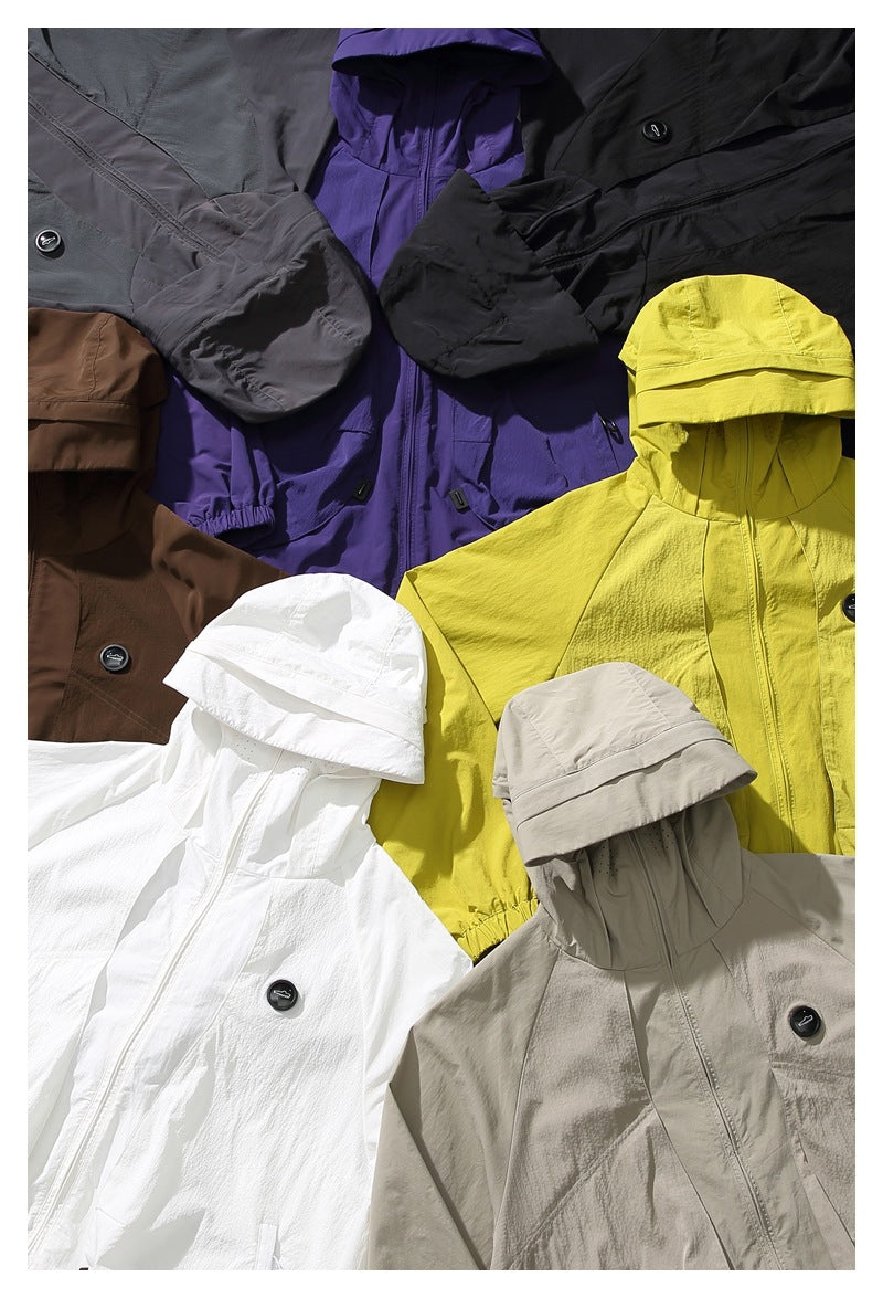 Several hooded jackets shown together in yellow-green, purple, black, gray, brown, white, and beige.