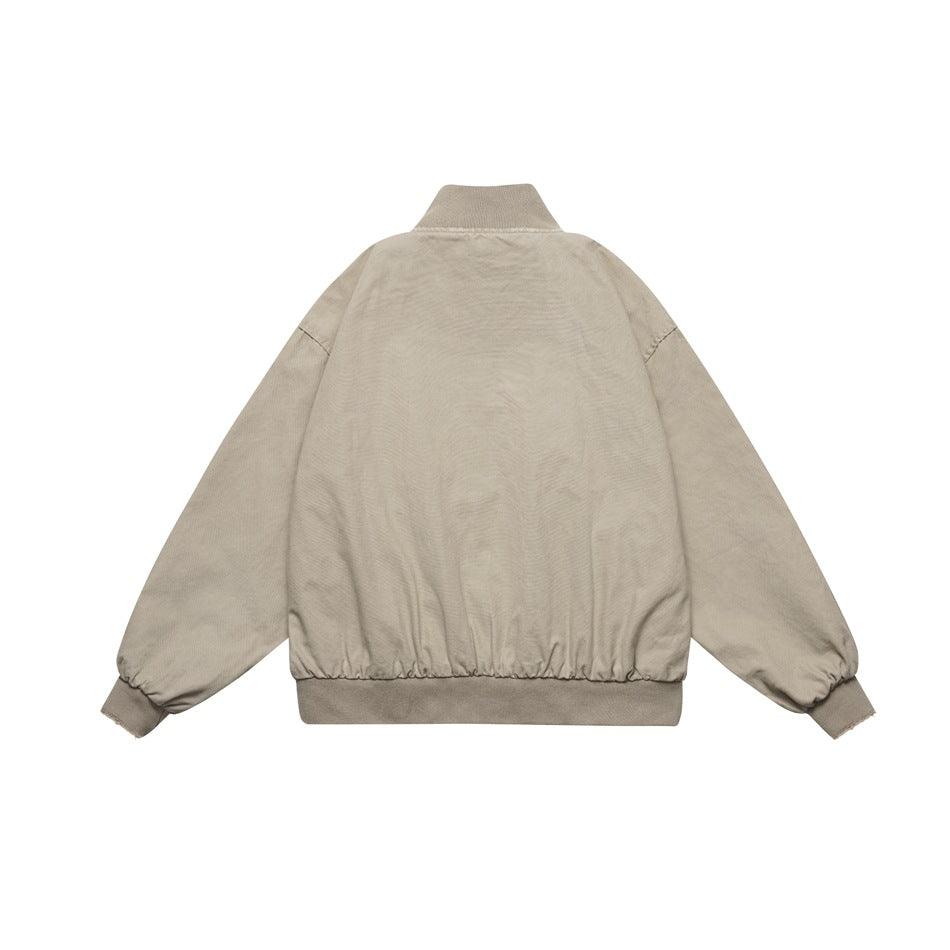 Back view of a light taupe jacket with a stand collar, long sleeves, and ribbed cuffs and hem.