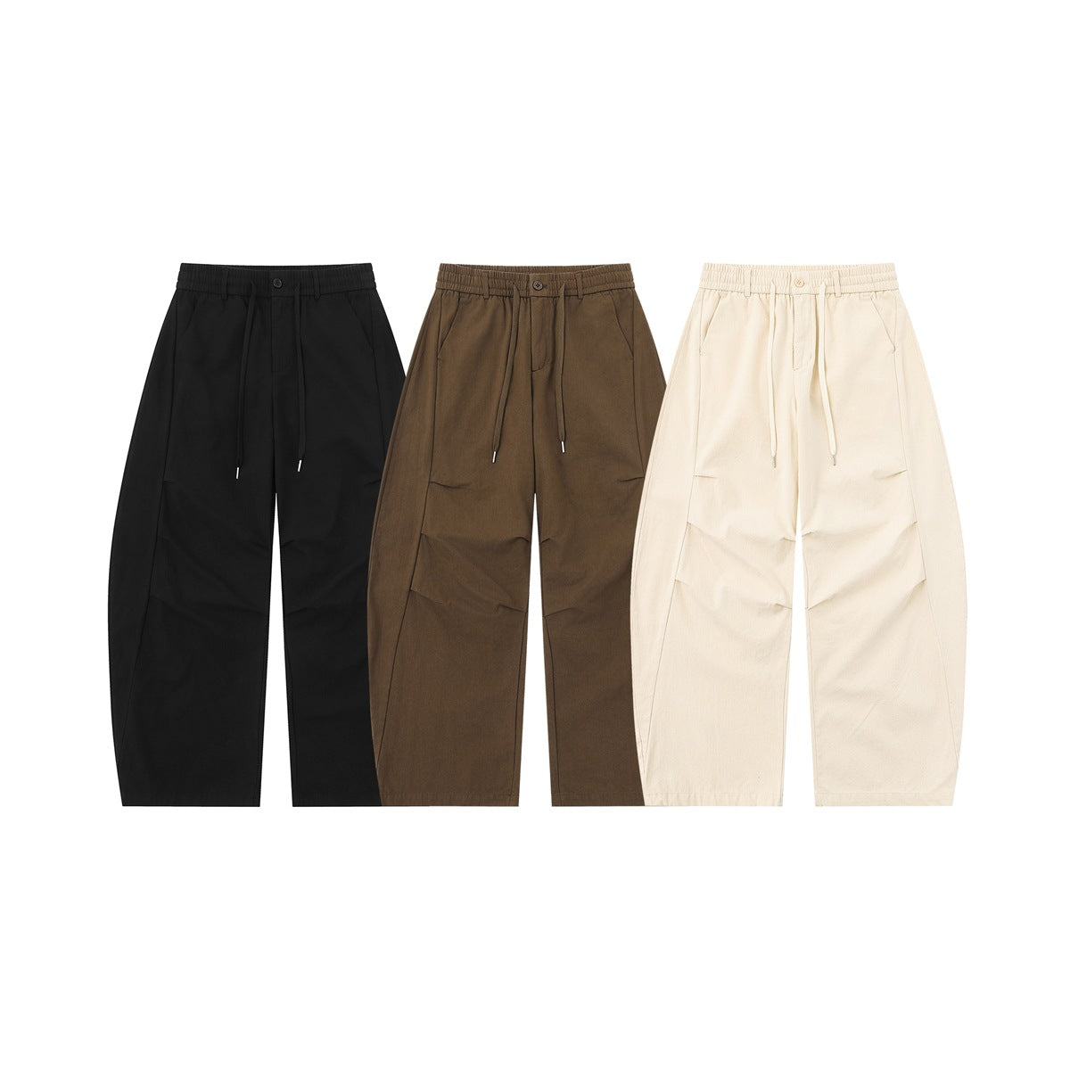 Three front views of wide-leg drawstring trousers in black, brown, and cream.