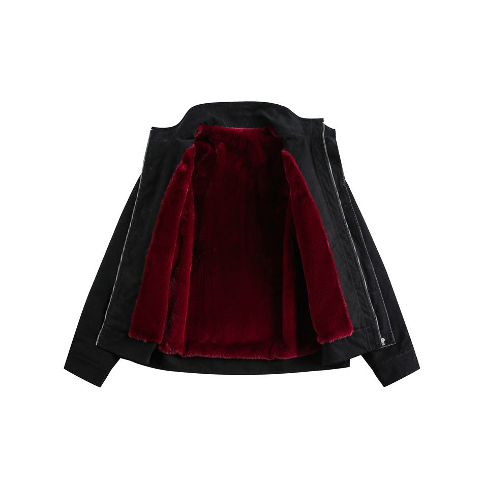 Black jacket opened flat to show its burgundy plush lining and front zipper.