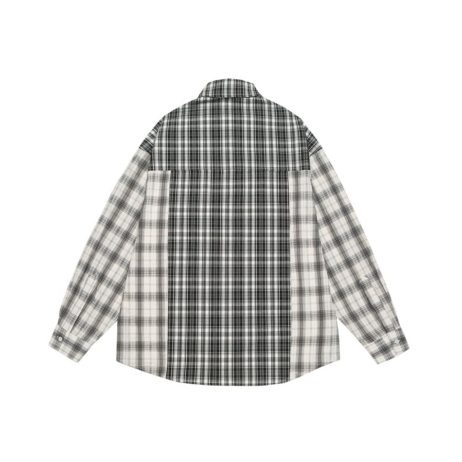 Back view of a black-and-white plaid long-sleeve button-up shirt with contrasting plaid panels.