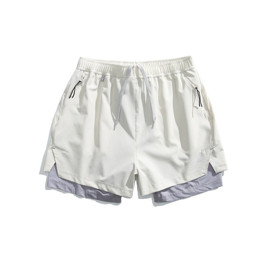 White double-layer athletic shorts with gray drawcord and lavender-gray inner layer, flat lay front view
