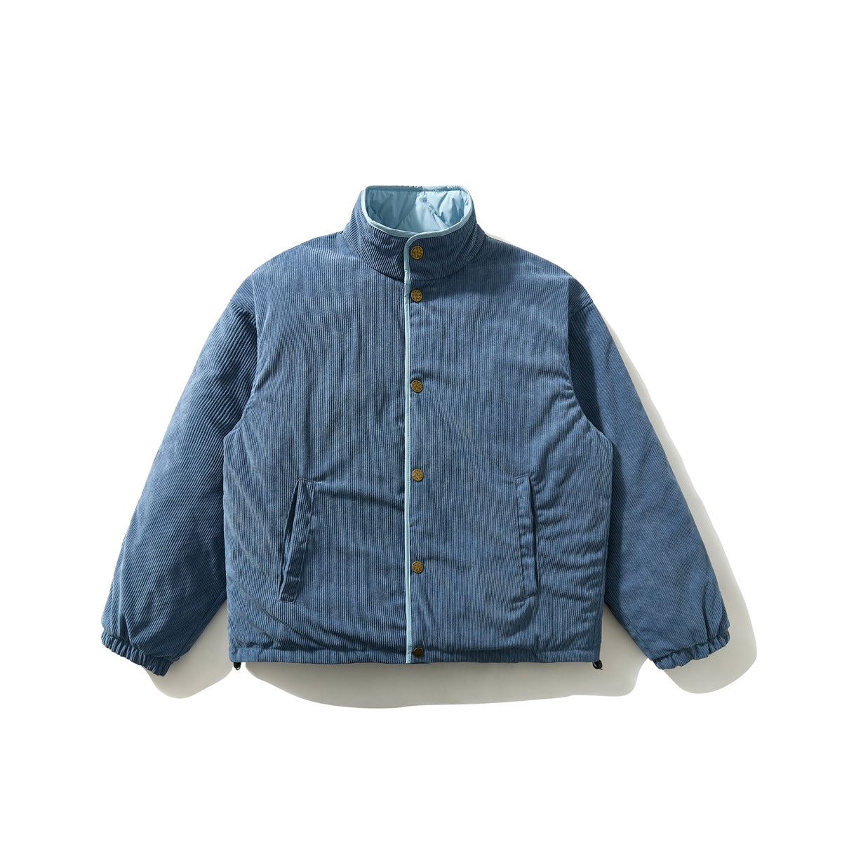 Blue ribbed corduroy-look stand-collar jacket flat lay with snap buttons, front pockets and elastic cuffs