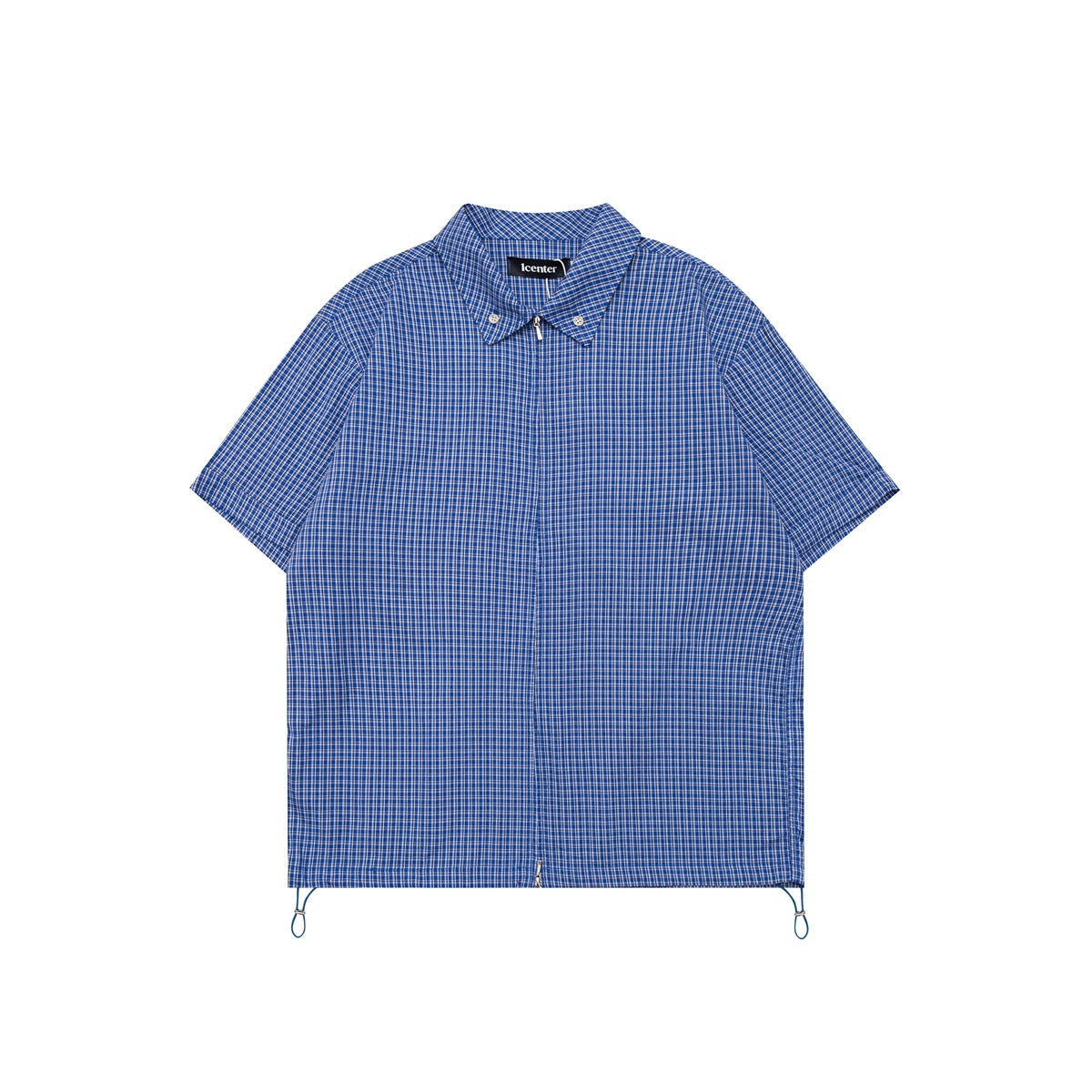 Blue small-check short-sleeve zip-front shirt with pointed collar and side hem drawcord toggles, flat lay