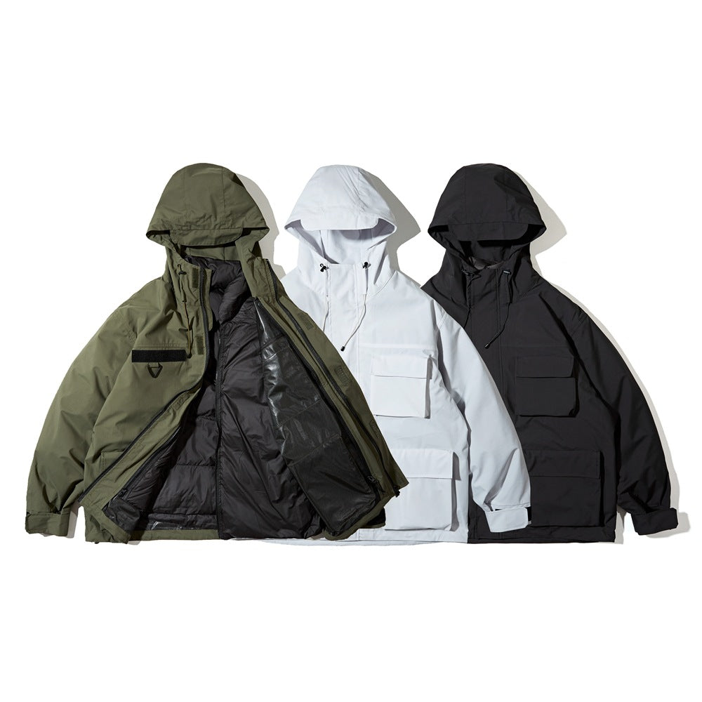 Three hooded utility jackets in olive, white, and black; the olive jacket is open to show its dark lining.