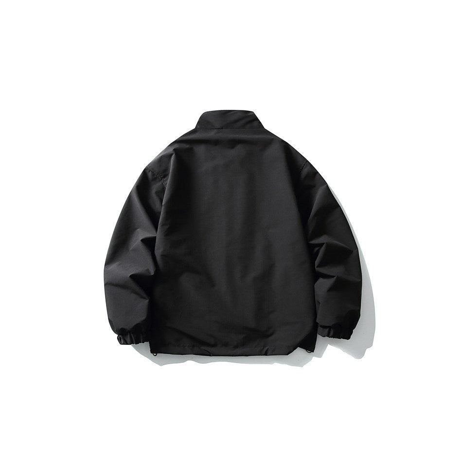 Back view of a black stand-collar jacket with long sleeves and gathered cuffs.