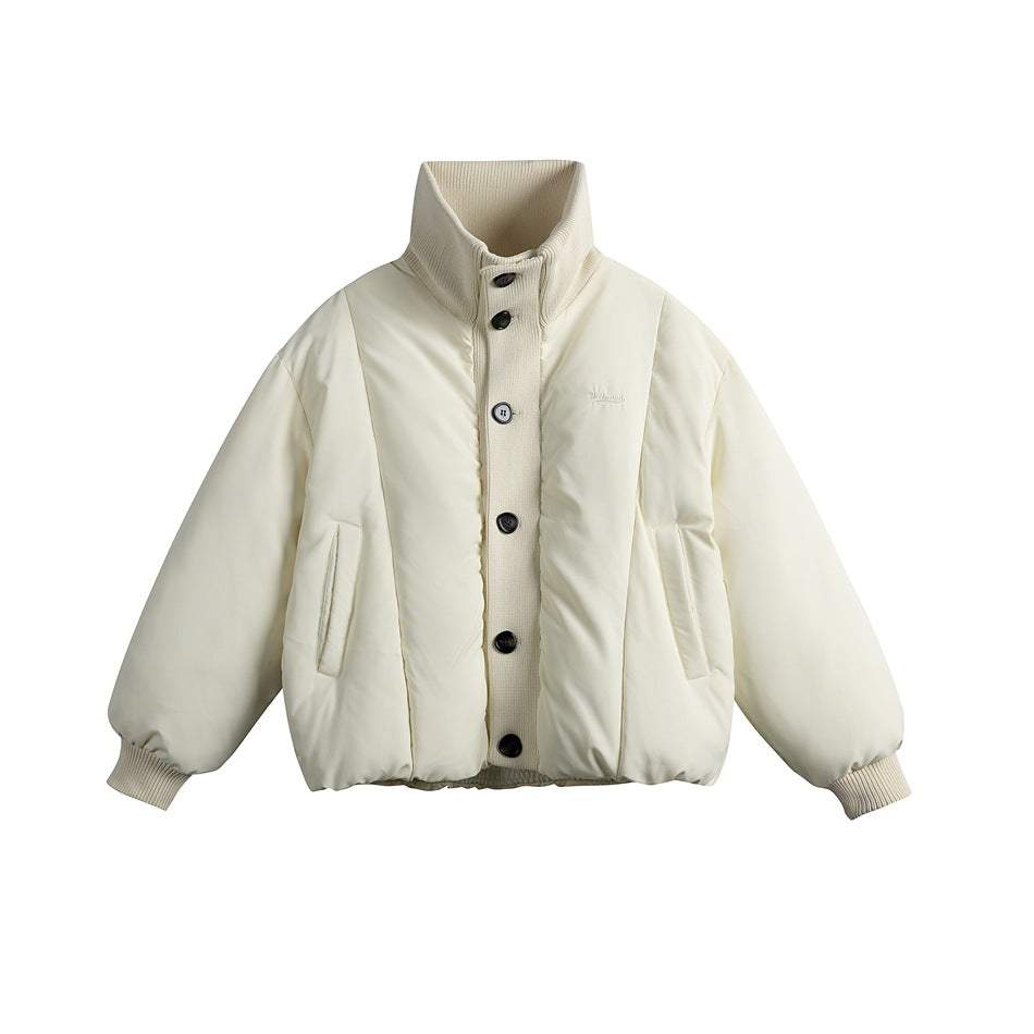 Beige puffer jacket with ribbed stand collar, button front, side pockets and ribbed cuffs, flat front view
