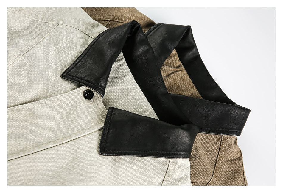 Close-up of light beige and taupe jackets showing their black collars and front buttons.