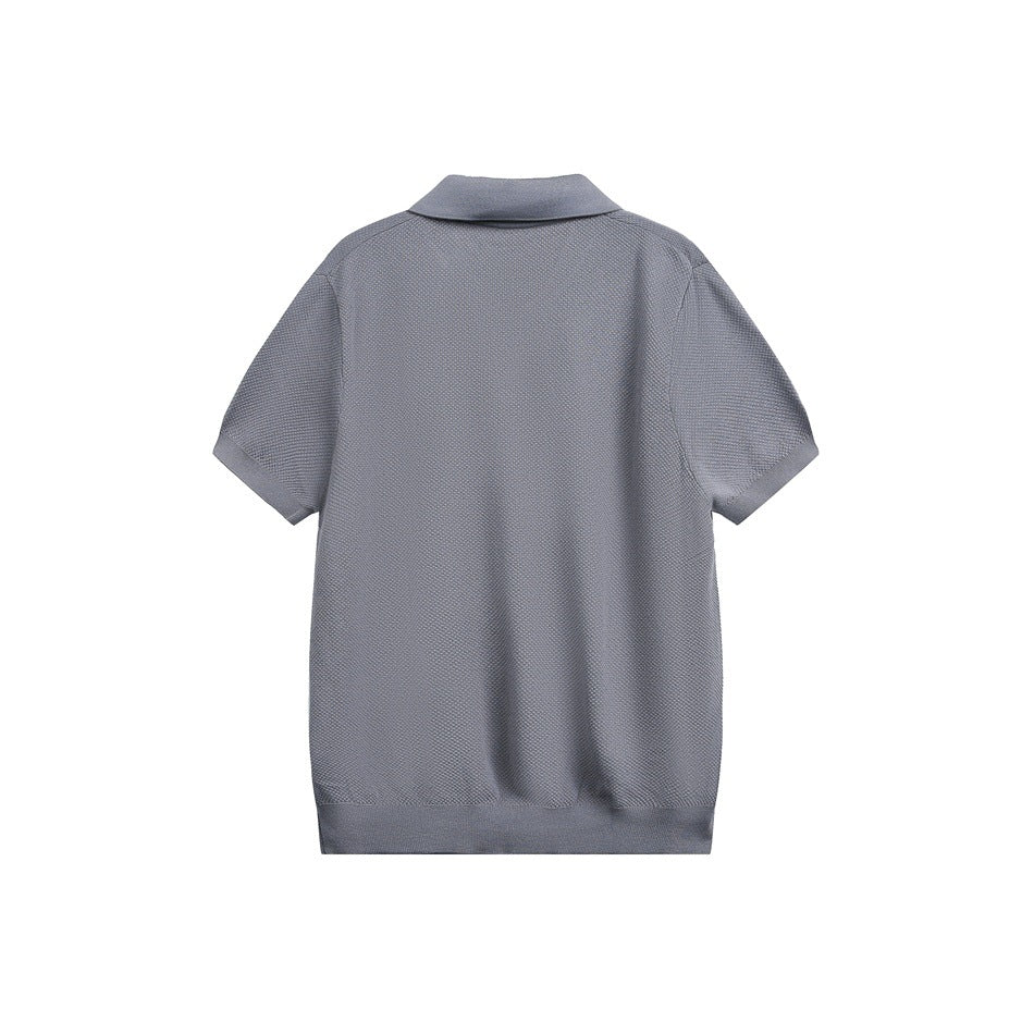 Back view of a gray short-sleeve polo shirt with a folded collar and ribbed hem.