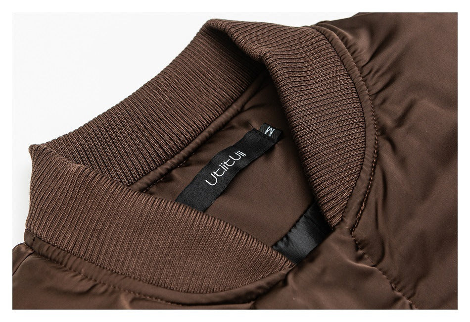 Close-up of the jacket's ribbed collar and inner neck label.
