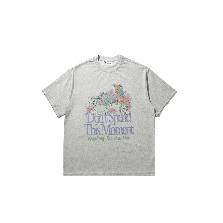 Heather gray short-sleeve crew-neck T-shirt with pastel cartoon puppy and flower graphic and slogan text