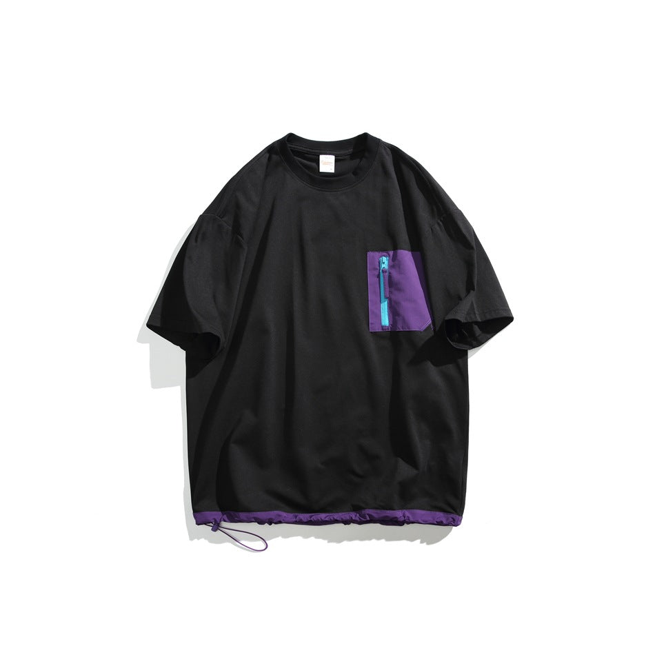 Black short-sleeve crewneck T-shirt with purple zippered chest pocket and purple drawcord hem trim, flat lay