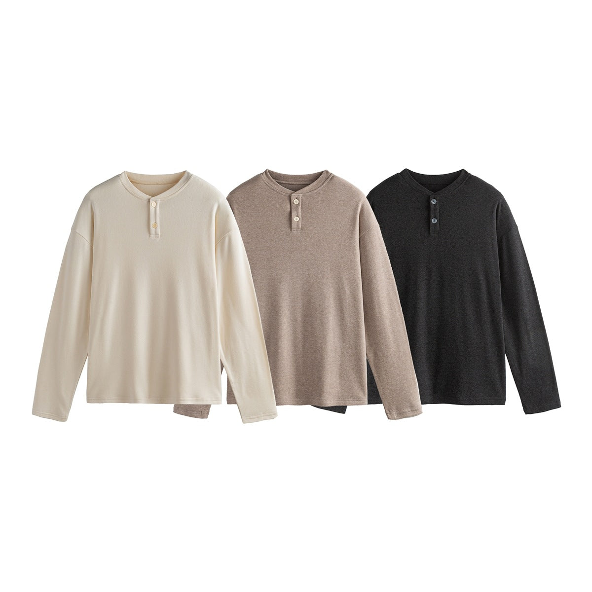 Three long-sleeve, two-button henley shirts shown in cream, taupe, and charcoal.