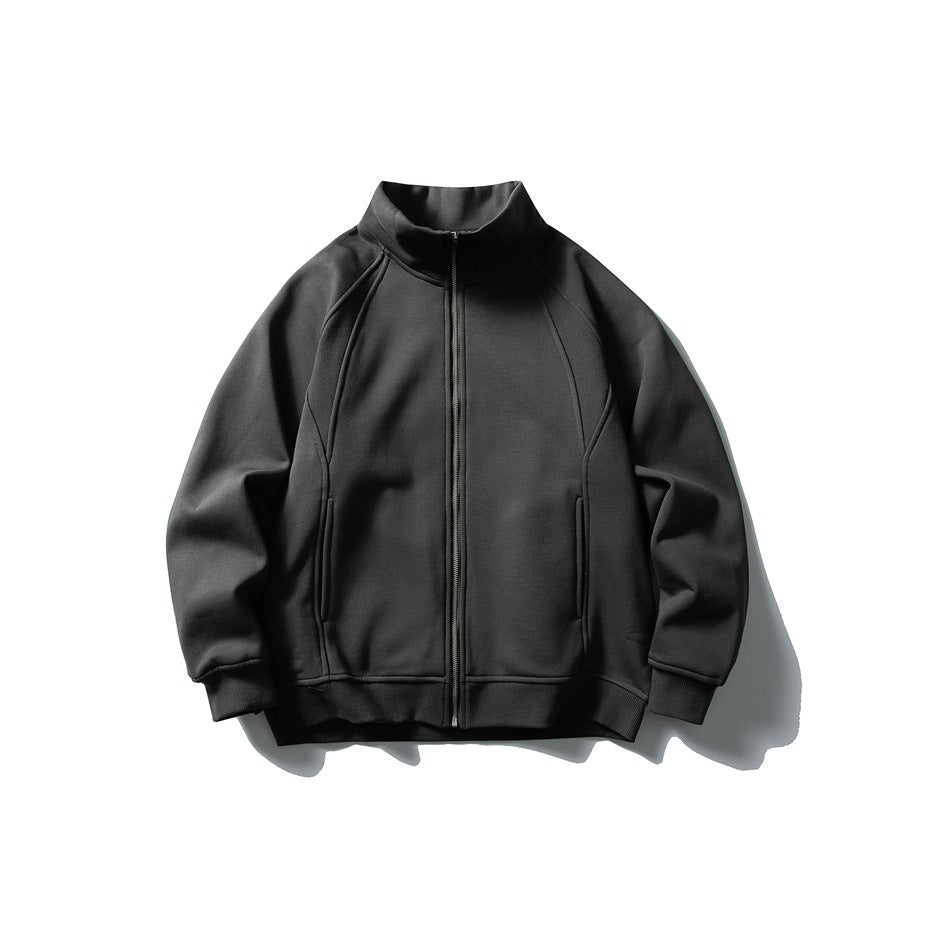 Dark gray zip-up stand-collar jacket flat lay, front view with slanted pockets and ribbed hem