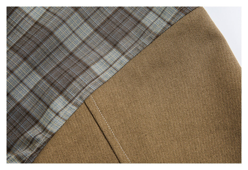 Close-up of brown ribbed fabric beside a brown, blue, and tan plaid panel with visible stitching.