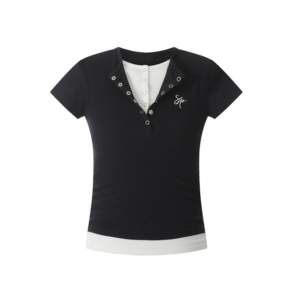 Black short-sleeve Henley-style top with white layered hem, silver snap buttons and small white script embroidery