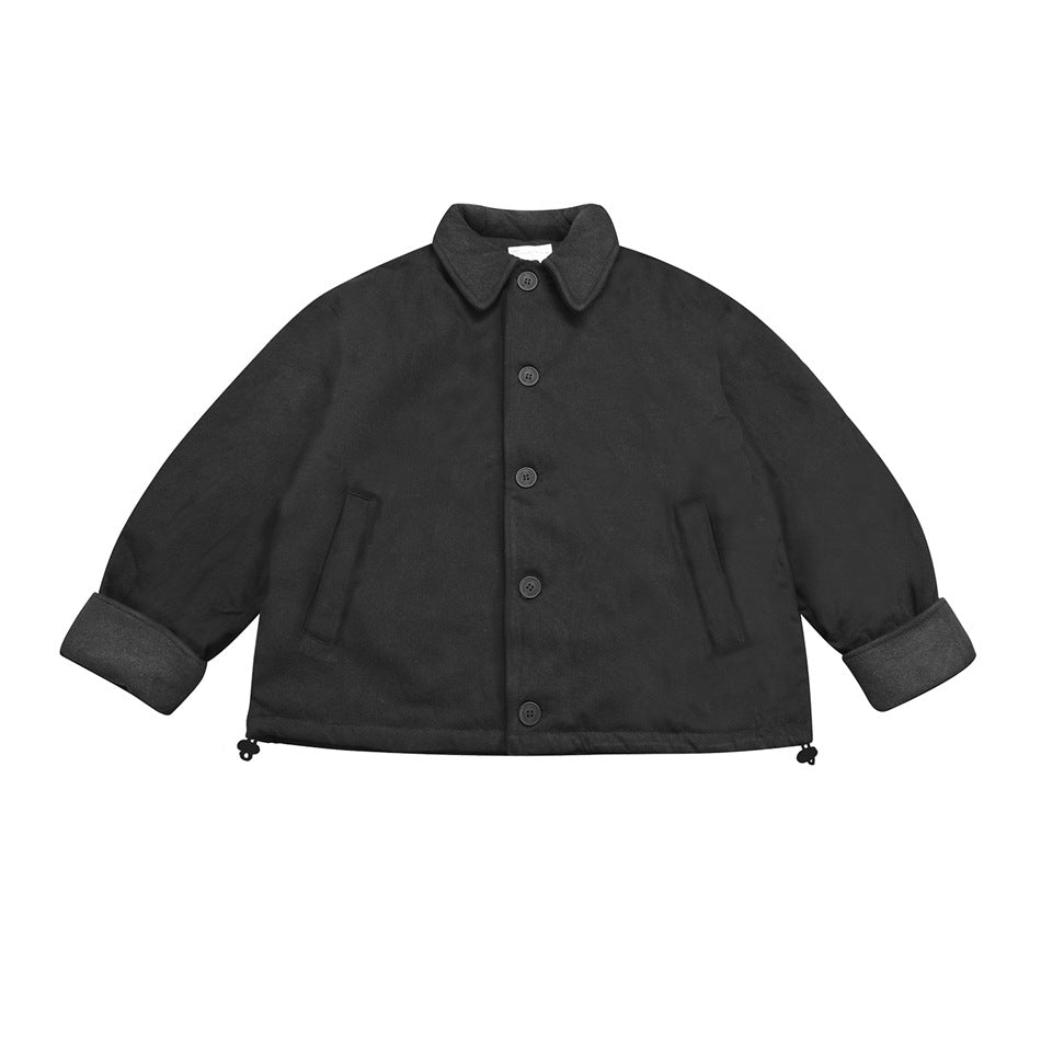 Black button-front jacket flat lay with collar, slit pockets, rolled gray cuffs and hem drawcord toggles