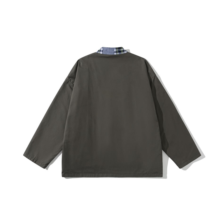 Back view of an olive jacket with long sleeves and a narrow plaid detail at the collar.