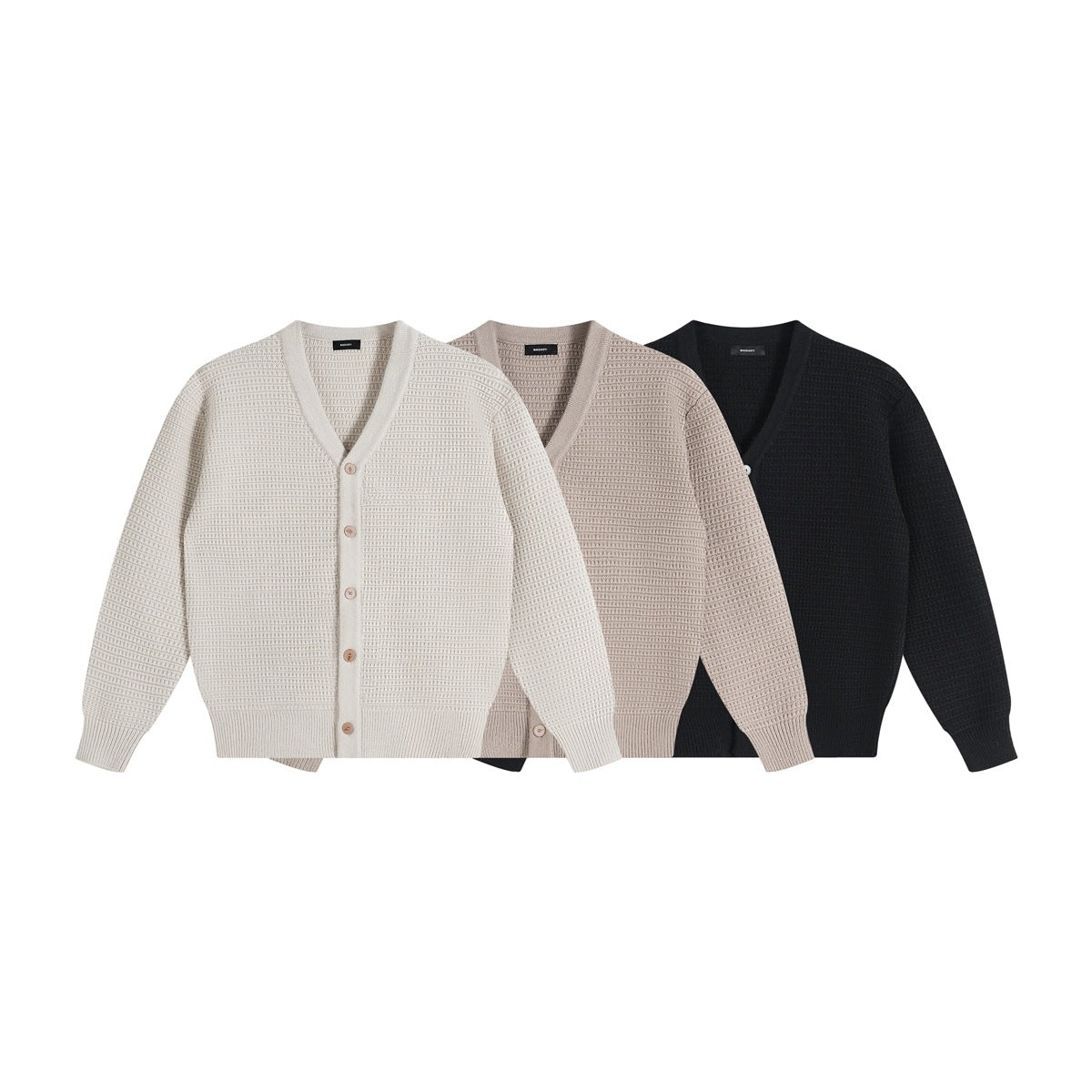 Three button-front V-neck cardigans displayed together in ivory, taupe, and black.