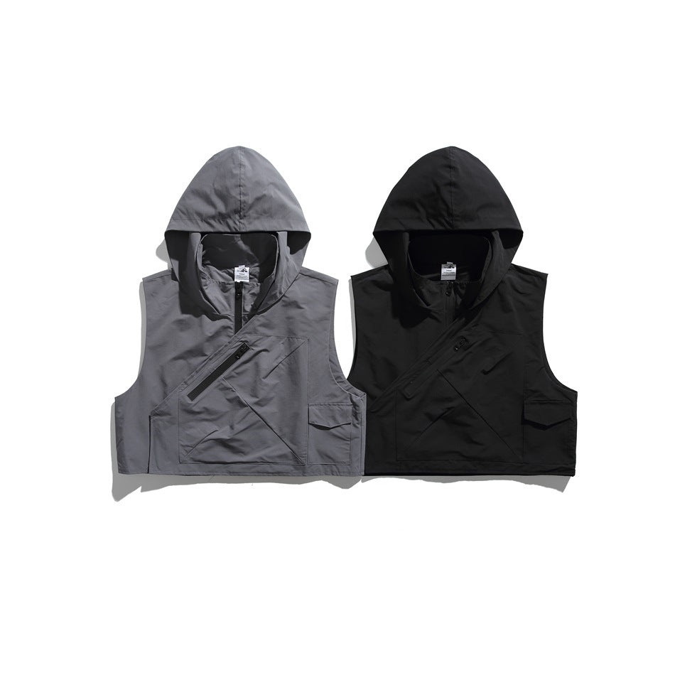 Front view of two sleeveless hooded vests, one gray and one black, with diagonal zippers and multiple pockets.