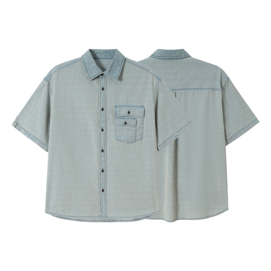 Light blue crosshatch short-sleeve button-up shirt shown from the front and back, with a double-flap chest pocket.