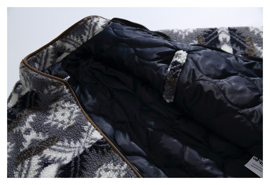 The garment is opened to show dark quilted lining, a zipper, and patterned fleece trim.