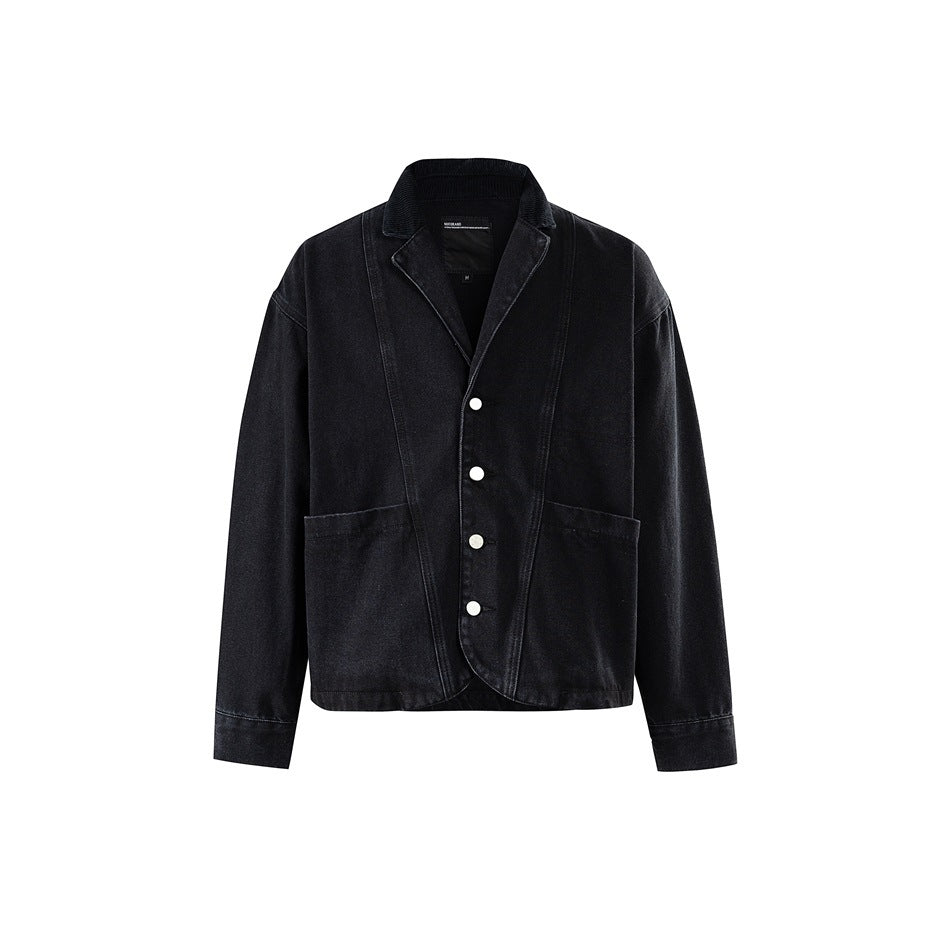 Black washed denim jacket front view with notched collar, four white buttons and two large patch pockets