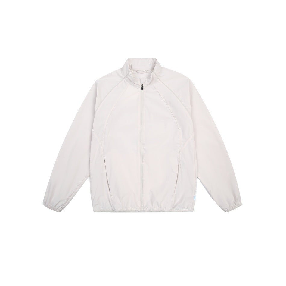 Front view of an off-white long-sleeve jacket with a stand collar, center zipper, curved seams and elastic cuffs.
