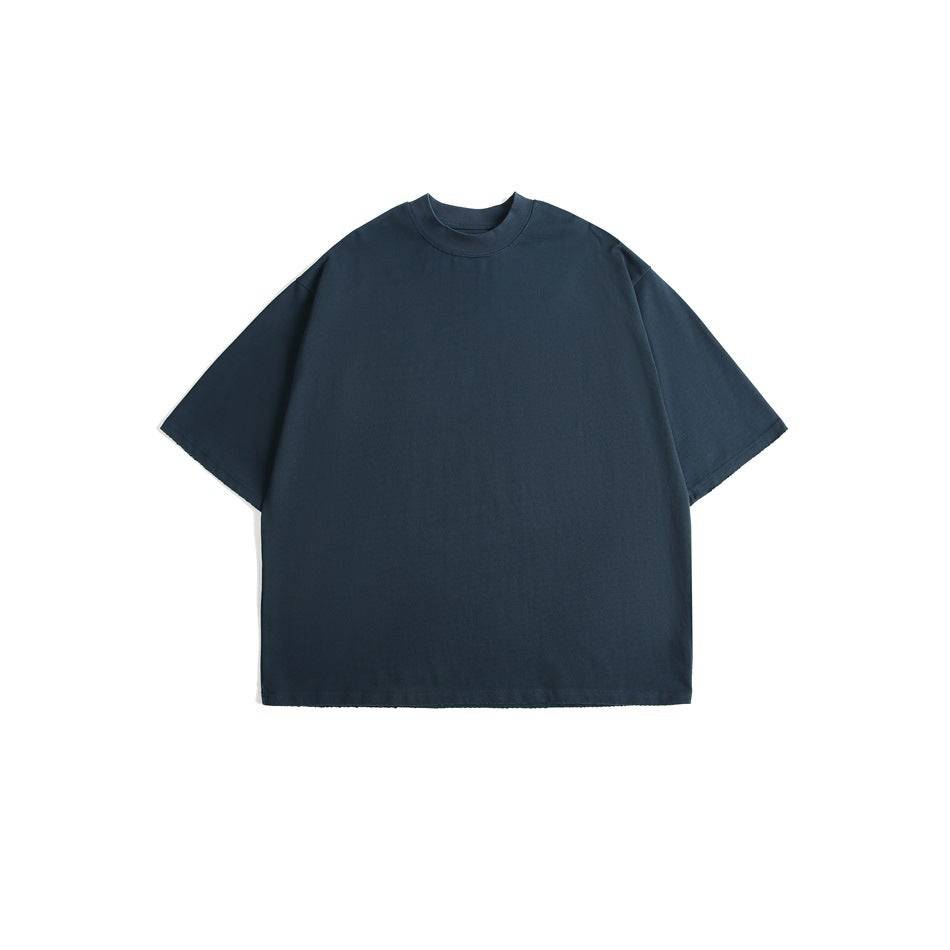 Front view of a plain dark navy oversized short-sleeve crew-neck T-shirt on a white background.
