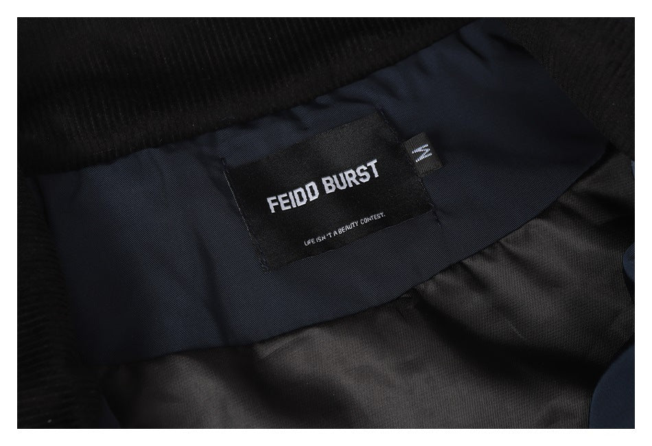 Close-up of a dark jacket's interior neck label reading “FEIDO BURST.”