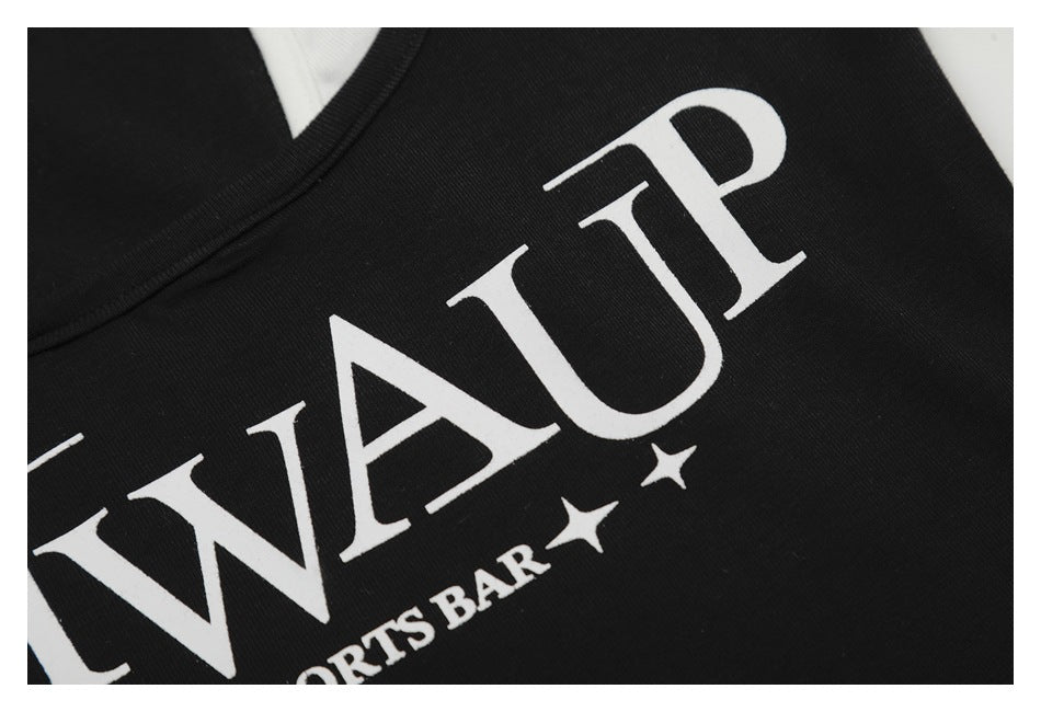 Close-up of the white “STWAUP SPORTS BAR” lettering and stars printed on black fabric.