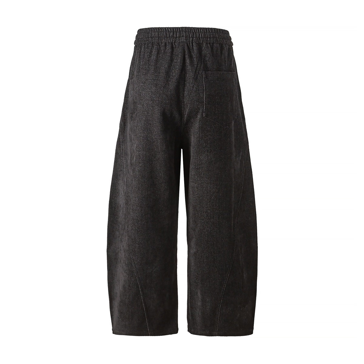 Black wide-leg pants back view showing elastic waistband, back patch pocket and curved leg seams