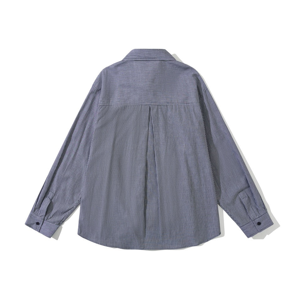 Flat lay back of a navy and white pinstripe long-sleeve shirt with a center box pleat and buttoned cuffs