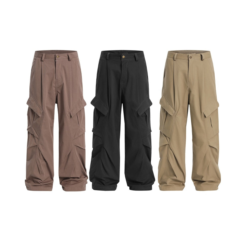 Three pairs of wide-leg cargo pants with oversized pockets in mauve, black, and tan.