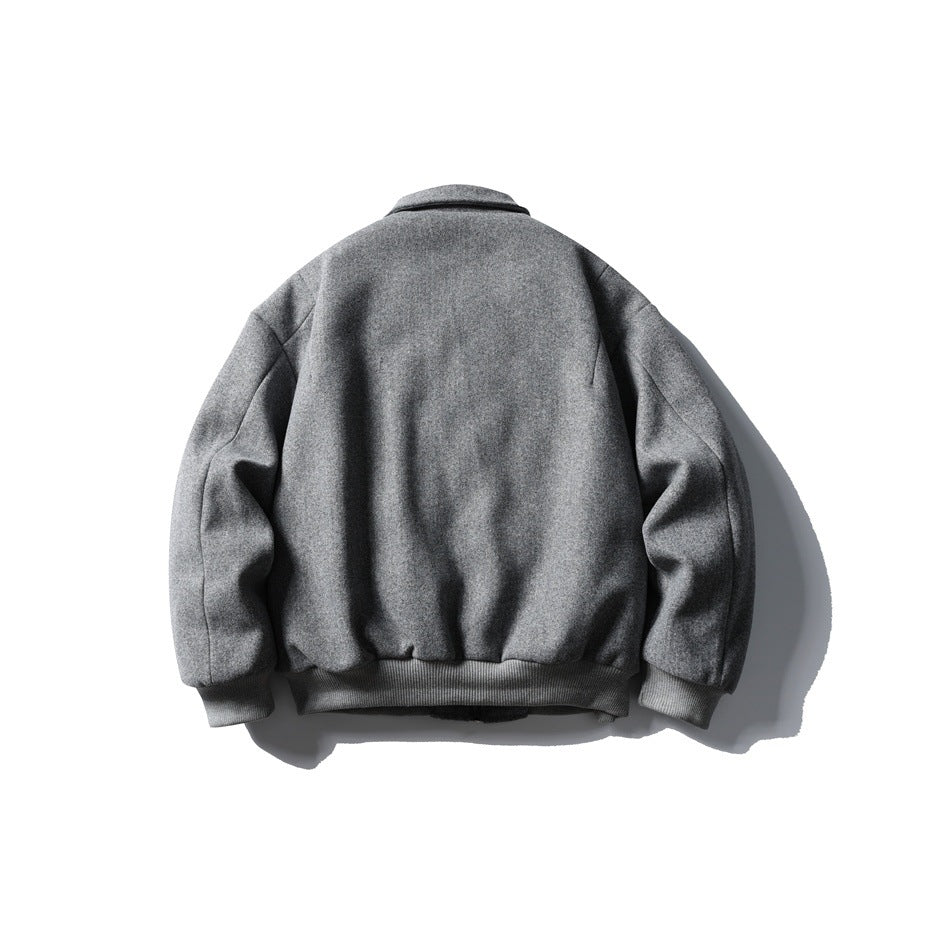 Back view of heather gray bomber-style jacket with plain back panel, dropped shoulders and ribbed hem