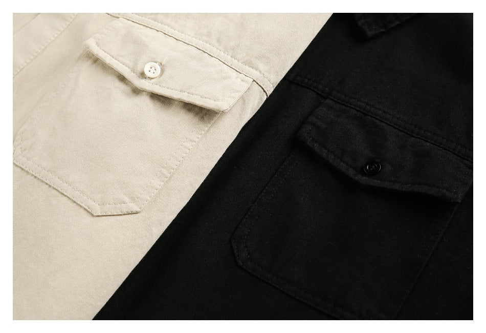 Close-up of beige and black shirts showing flap chest pockets and buttons.