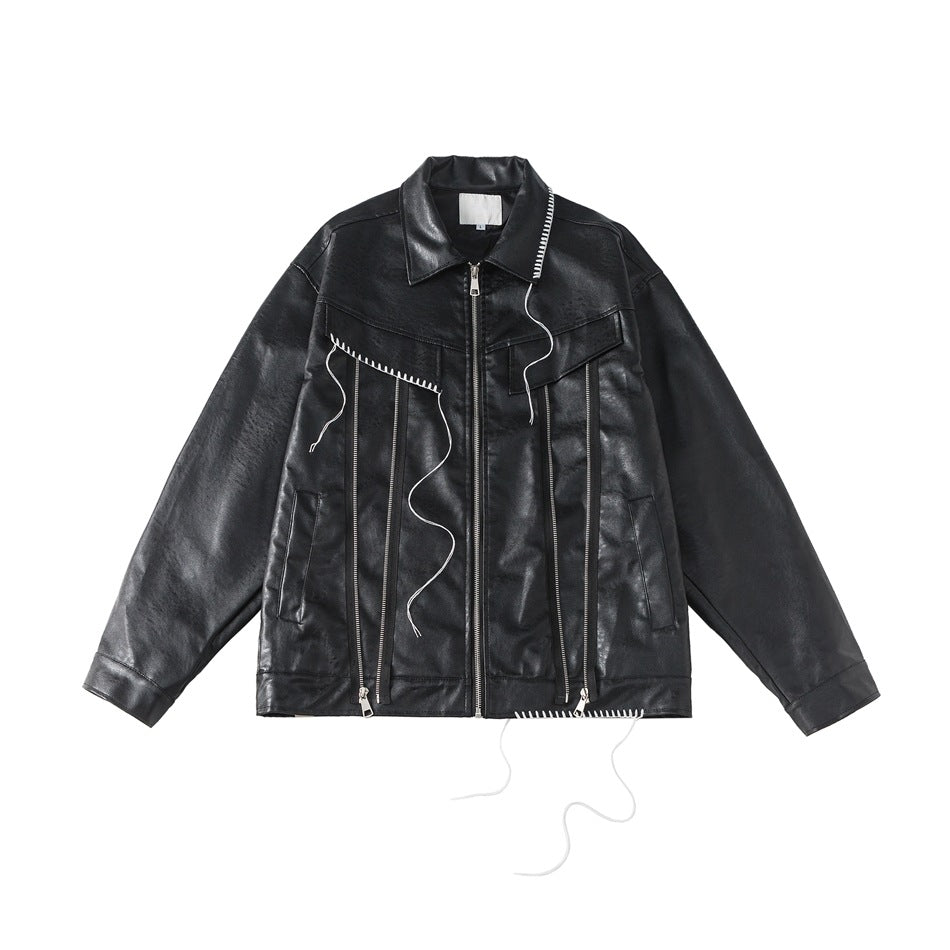 Black faux-leather zip jacket flat lay with white stitching, vertical zippers and loose white cords