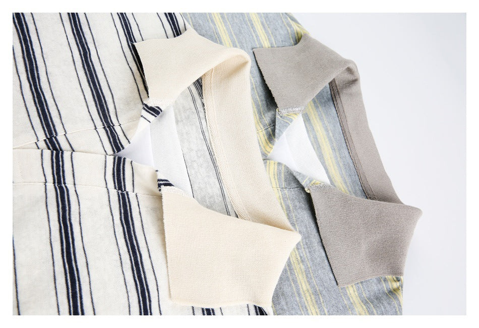 Close-up of the cream and gray collars on two striped polo shirts.