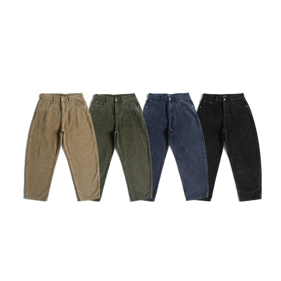 Four pairs of ribbed pants shown from the front in tan, olive, navy and black.